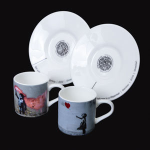 Set of two espresso cups and saucers by Banksy